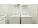 Bright laundry room with washer and dryer at 609 Morning Light Dr, Angier, NC 27501