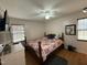 Bedroom with king-size bed, dresser and ceiling fan at 6908 Park Pl, Raleigh, NC 27616