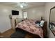 Bedroom with king-size bed, dresser and ceiling fan at 6908 Park Pl, Raleigh, NC 27616