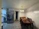 Dining area with wood table and chairs near kitchen at 6908 Park Pl, Raleigh, NC 27616