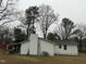 Back of the house with a chimney, showing additional outdoor space at 6908 Park Pl, Raleigh, NC 27616