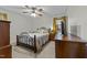 Cozy bedroom with a ceiling fan and wood dresser at 7205 Paddock Dr, Raleigh, NC 27613