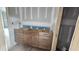 Bathroom featuring unfinished vanity with drawers and wood accents at 7934 Wexford Waters Ln, Wake Forest, NC 27587