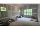A bedroom with vaulted ceilings, three windows, and drywall construction at 7934 Wexford Waters Ln, Wake Forest, NC 27587