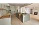 Spacious kitchen with custom cabinets, an island, and modern design elements under construction at 7934 Wexford Waters Ln, Wake Forest, NC 27587