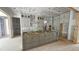 Kitchen under construction featuring a large center island, ample cabinetry, and open layout at 7934 Wexford Waters Ln, Wake Forest, NC 27587