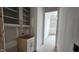 Pantry area featuring light cabinetry, drawers and shelving during the construction phase at 7934 Wexford Waters Ln, Wake Forest, NC 27587