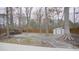 Landscaped backyard with a gravel pathway and shed at 915 Da Vinci St, Durham, NC 27704