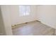 Simple bedroom with wood-look floors and a closet at 915 Da Vinci St, Durham, NC 27704