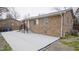 Brick house with a patio, steps, and backyard at 915 Da Vinci St, Durham, NC 27704