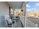 Front porch with rocking chairs, a swing, and hanging basket at 10 Saddletree Dr, Franklinton, NC 27525