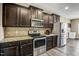 Modern kitchen features stainless steel appliances and granite countertops at 10080 Nc-39, Middlesex, NC 27557