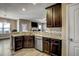Island kitchen with granite countertops and stainless steel dishwasher at 10080 Nc-39, Middlesex, NC 27557