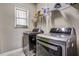 Laundry room with LG washer and dryer and additional shelving at 10080 Nc-39, Middlesex, NC 27557