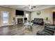 Living room with fireplace and open concept to kitchen at 10080 Nc-39, Middlesex, NC 27557