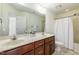 Bathroom with double vanity and shower/tub combo at 105 Danesway Dr, Holly Springs, NC 27540