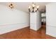 Bright dining room features hardwood floors and kitchen access at 105 Danesway Dr, Holly Springs, NC 27540