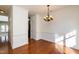 Bright dining room with hardwood floors and exterior access at 105 Danesway Dr, Holly Springs, NC 27540