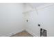 Laundry room with shelving and tile flooring at 105 Danesway Dr, Holly Springs, NC 27540