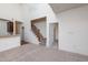 Spacious living room with high ceilings, fireplace, and hardwood floors at 105 Danesway Dr, Holly Springs, NC 27540