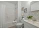Bathroom featuring bathtub, updated vanity and lighting at 1108 Taylor St, Durham, NC 27701