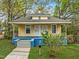 Charming one-story home with a welcoming front porch and landscaped front yard at 1108 Taylor St, Durham, NC 27701