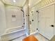 Elegant bathroom with a soaking tub and walk-in shower at 113 Meadowglades Ln, Cary, NC 27518