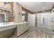 Large bathroom with double vanity and walk-in shower at 113 Meadowglades Ln, Cary, NC 27518