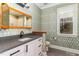 Stylish bathroom with patterned wallpaper and modern vanity at 113 Meadowglades Ln, Cary, NC 27518