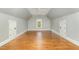 Spacious bonus room with hardwood floors and sloped ceilings at 113 Meadowglades Ln, Cary, NC 27518