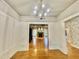 Elegant dining room offering hardwood floors and views to living room at 113 Meadowglades Ln, Cary, NC 27518
