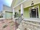 Charming front entrance with stone steps, iron railings, and a covered porch for curb appeal at 113 Meadowglades Ln, Cary, NC 27518