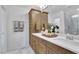 Double vanity bathroom with modern finishes and a large mirror at 1204 Alston Landing Way # 07, Cary, NC 27519