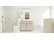 Elegant bathroom with a walk-in shower and double vanity at 1528 Goldfinch Perch Ln, Knightdale, NC 27545
