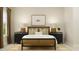 Well-lit bedroom with a cane headboard bed and nightstands at 1528 Goldfinch Perch Ln, Knightdale, NC 27545