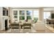 Spacious living room with sectional sofa and fireplace at 1528 Goldfinch Perch Ln, Knightdale, NC 27545