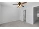 Bright bedroom has carpet, ceiling fan, and natural light from window at 3 Cheltenham Dr, Clayton, NC 27520