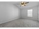 Neutral bedroom features carpet and a window with natural light at 3 Cheltenham Dr, Clayton, NC 27520