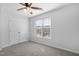 Bright bedroom with closet and a window offering natural light at 3 Cheltenham Dr, Clayton, NC 27520