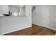 Living room with hardwood floors, a granite counter and staircase at 3 Cheltenham Dr, Clayton, NC 27520