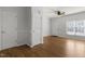 Inviting living room with hardwood floors, large windows, and neutral paint at 3 Cheltenham Dr, Clayton, NC 27520