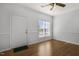 Bright Living room featuring hardwood floors, neutral walls and a front door at 3 Cheltenham Dr, Clayton, NC 27520