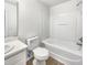 Bathroom with tub, toilet and single vanity at 3113 Skybrook Ln, Durham, NC 27703
