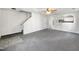 Spacious living room with grey carpet and view into kitchen at 3113 Skybrook Ln, Durham, NC 27703