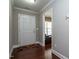 Bright entryway with hardwood floors and access to office at 332 Dove Cottage Ln, Cary, NC 27519