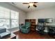 Home office with hardwood floors and large window at 332 Dove Cottage Ln, Cary, NC 27519