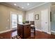Kitchen island with granite countertop and seating for two at 332 Dove Cottage Ln, Cary, NC 27519
