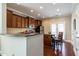 Modern kitchen with granite countertops and island at 332 Dove Cottage Ln, Cary, NC 27519