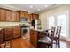 Kitchen with stainless steel appliances and island at 332 Dove Cottage Ln, Cary, NC 27519