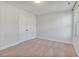 Bright bedroom featuring double door closet and window at 3366 Mission Olive Pl, New Hill, NC 27562